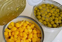 canned vegetables are corn and peas in open cans  220x150 - طرح تولید کنسرو ذرت و نخود فرنگی